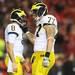 Michigan offensive linesman Taylor Lewan stops to talk to quarterback Russell Bellomy during the third quarter against Nebraska at Memorial Stadium in Lincoln, Nebraska on Saturday. Melanie Maxwell I AnnArbor.com